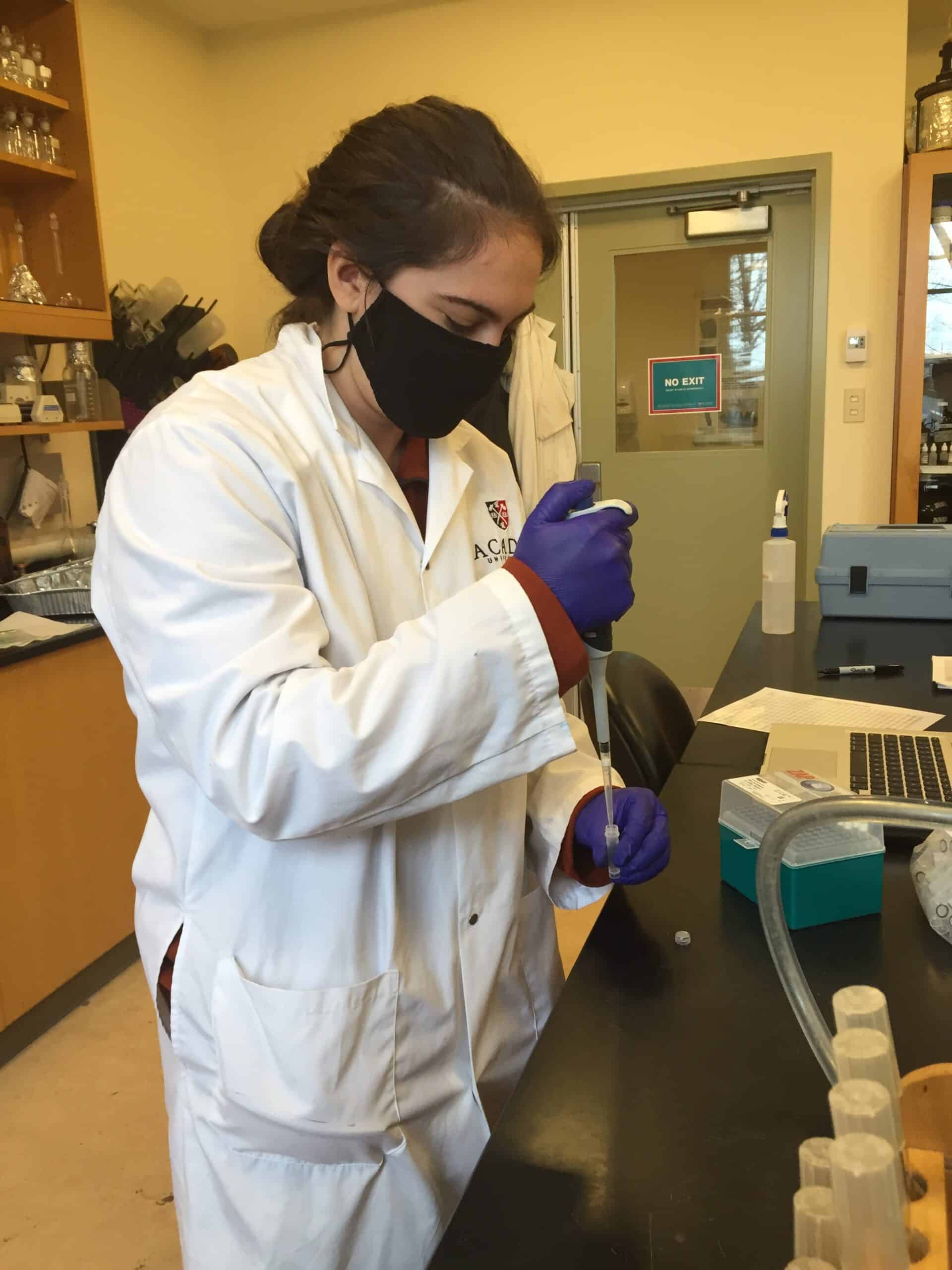 Student Claire working in the lab